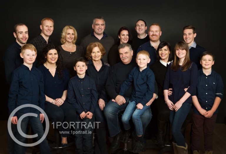 Gift for parents & grandparents: a generational family portrait of grandparents, paremts & grandchildren taken in a professional family portrait photography studio